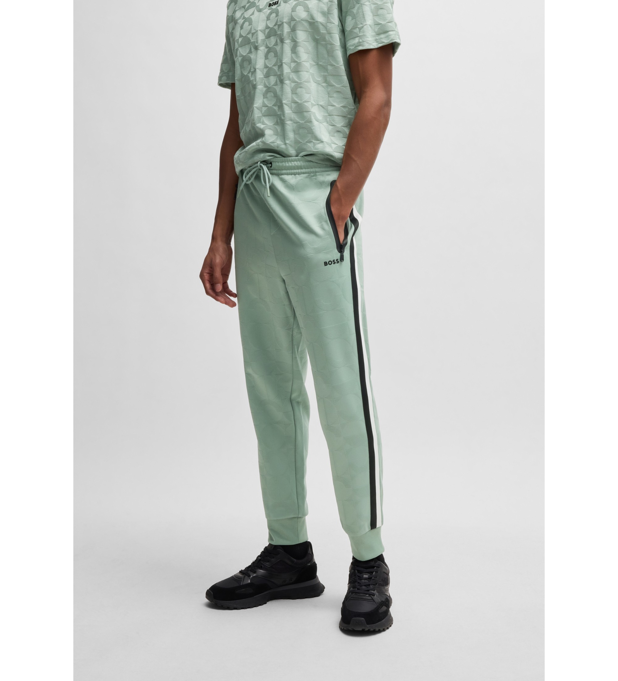 BOSS für Herren. 50537373 Jogginghose in lockerer Passform mit gewebten grünen Jacquard-Kreisen (XS), Lässig, Polyester