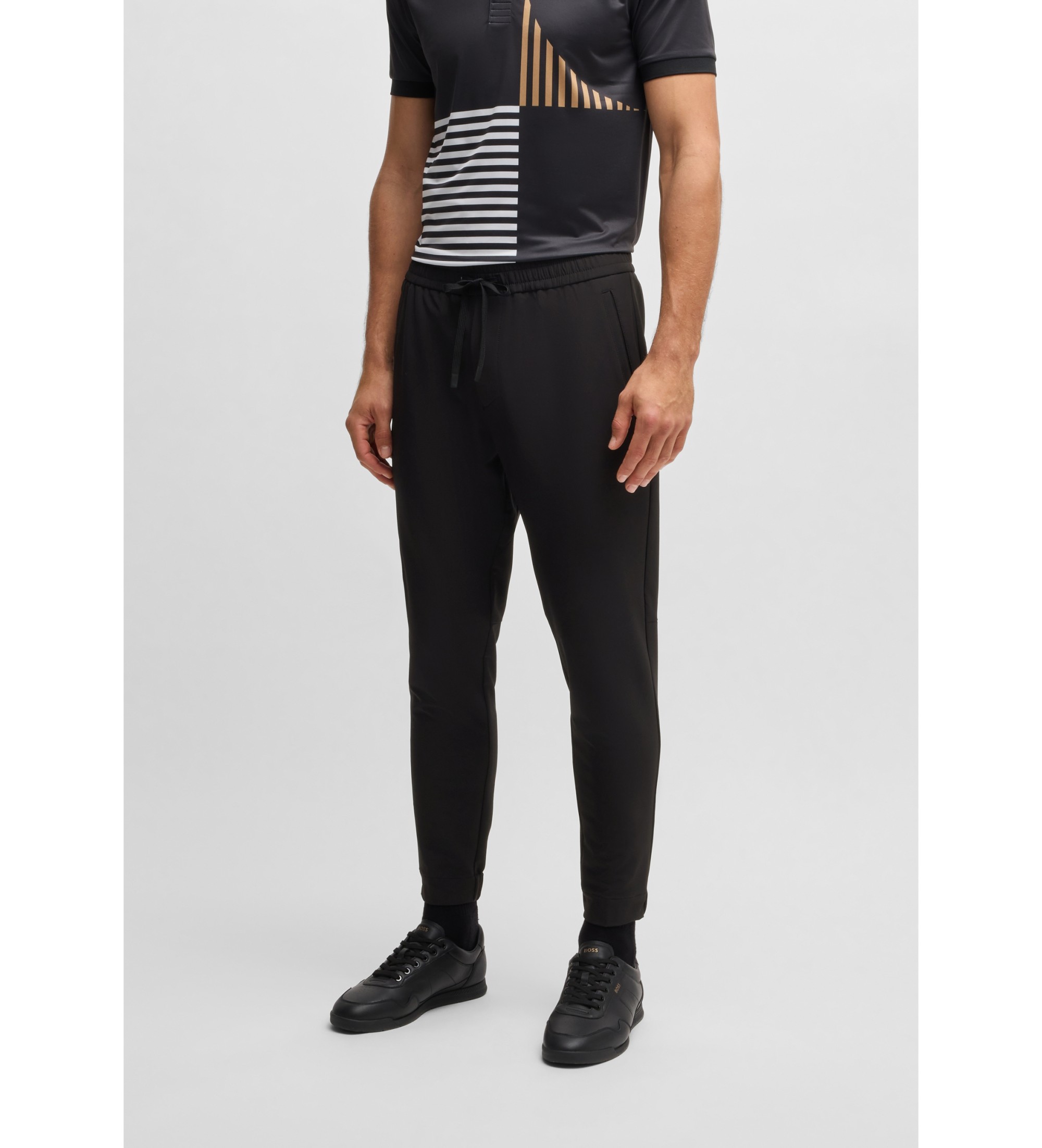 BOSSvoor mannen. 50534313 T Flex broek zwart (46), Casual, Gerecycled polyester, Duurzaam