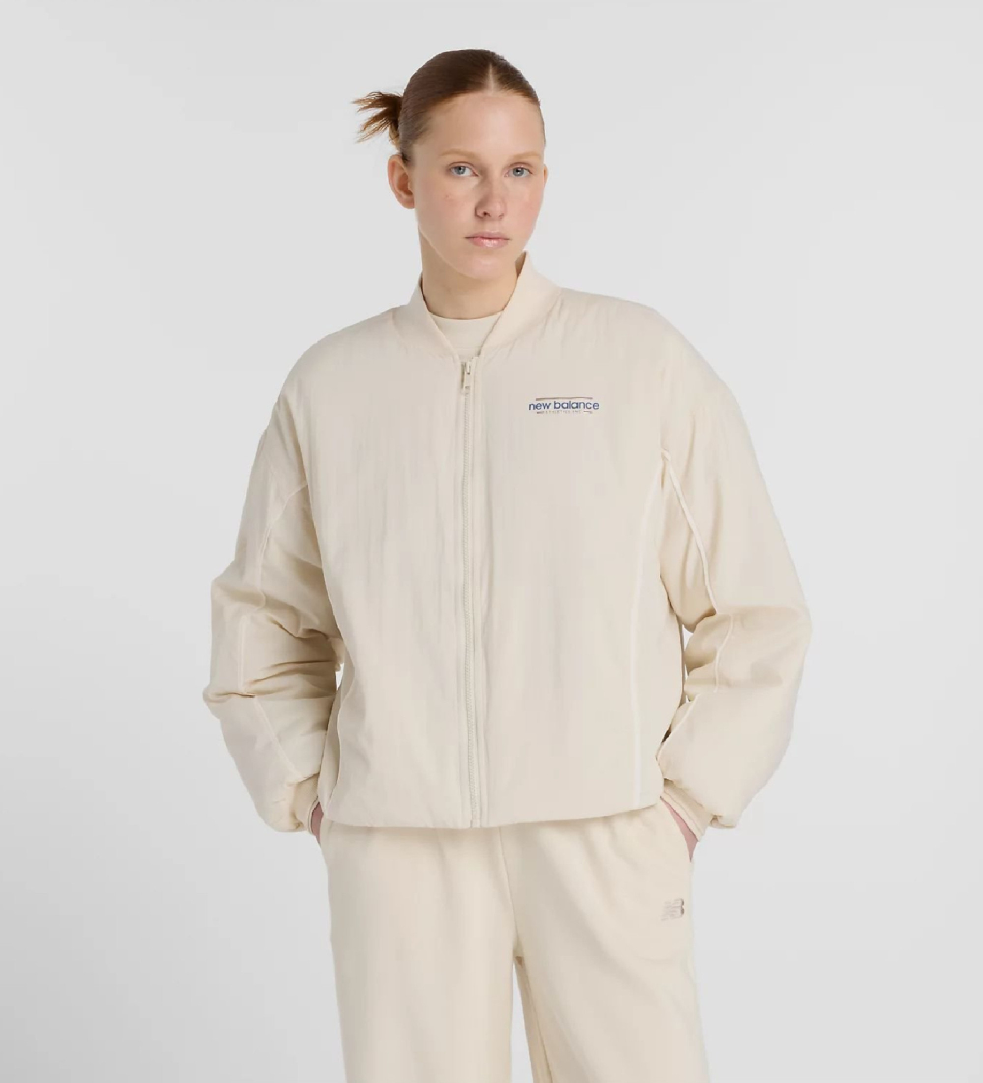 New Balance für Damen. WJ53500 Gewebte Bomberjacke neu erfunden beige (L), Lässig, Nylon
