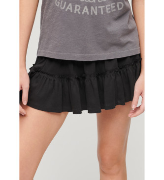 Superdry para mujer. W7210319A Minifalda de punto escalonada negro (L), Casual, Algodón
