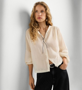 Jennias blus i brutet