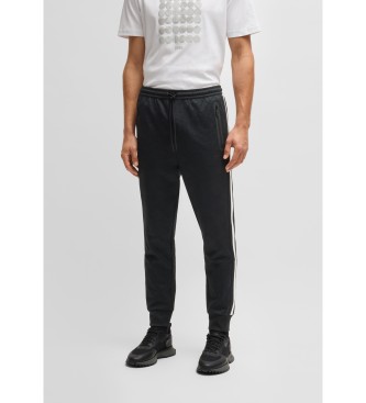 BOSS para hombre. 50537373 Pantalón de chándal relaxed fit con círculos tejidos en jacquard negro (S), Casual, Poliéster