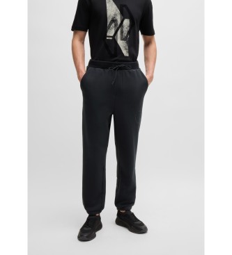 BOSS para hombre. 50523899 Pantalón Huggel negro (M), Casual, Poliéster