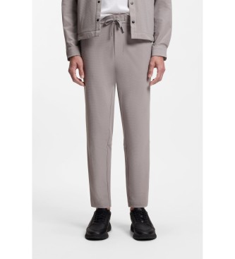 BOSS para hombre. 50551956 Pantalones tapered fit en tejido elástico con estructura de rejilla beige (46), Casual, Algodón