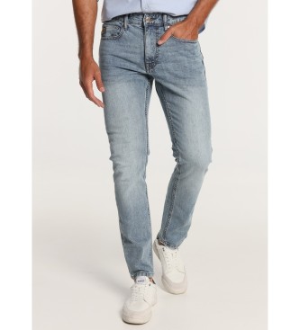 Lois Jeans para homem. Cal?as de ganga slim - cintura m?dia lavada | T