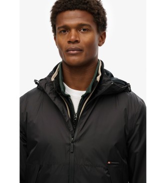 Superdry para hombre. M5012101A Chaqueta cortavientos con capucha y logotipo negro 2