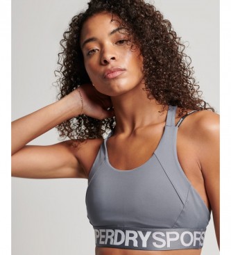 Superdry para mujer. WS311692A Sujetador Elástico Logo Train gris (44), Deportivo, Multideporte, Poliéster Reciclado, Sostenible